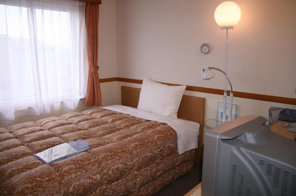 Toyoko Inn Hirosaki Ekimae Quarto foto